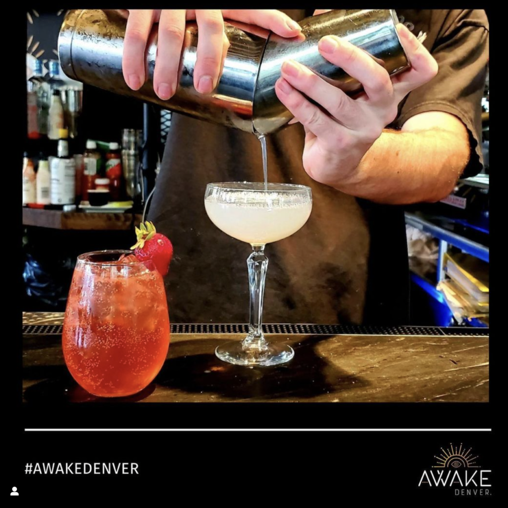 An alcohol-free mixed drink being poured at Awake Bar in Denver